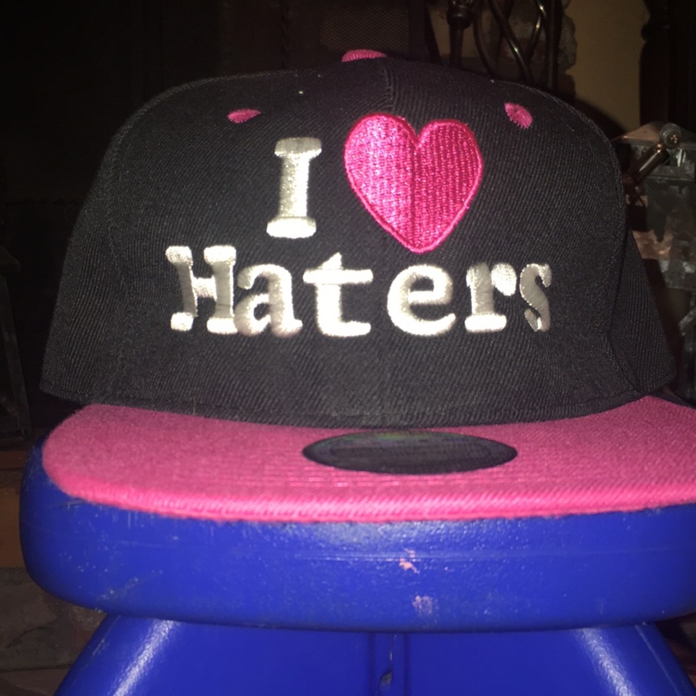 Pink and black hat